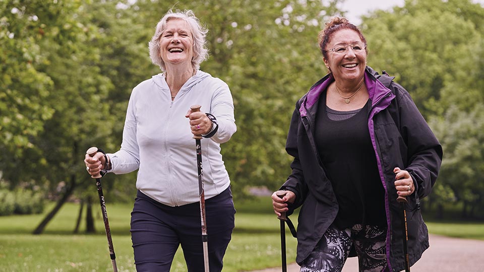 Two women enjoy Nordic walking